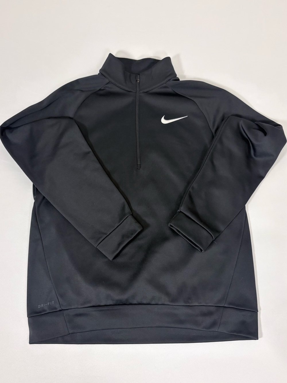Nike Black Half-Zip Performance Pullover with White Swoosh